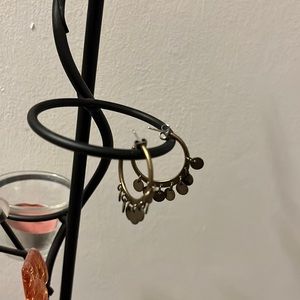 Brassy gold bangle hoops(not actual gold. Just referring to color)